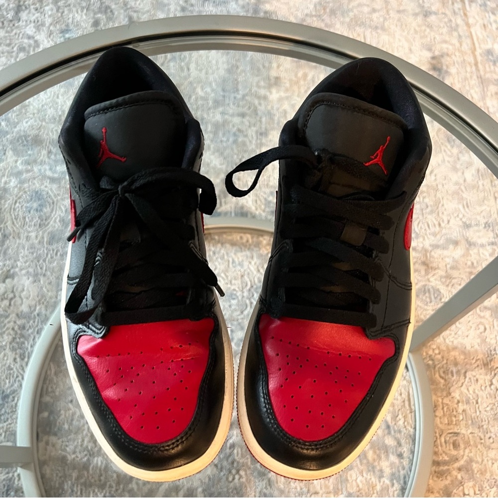 Womens Black and red Jordans 1 low